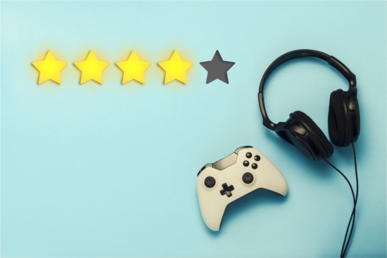 Pad, earphones, and a star rating/score symbolising a silent review