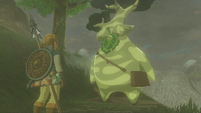 Link talking to a Korok character in The Legend of Zelda: Breath of the Wild, showcasing hidden collectibles and exploration.