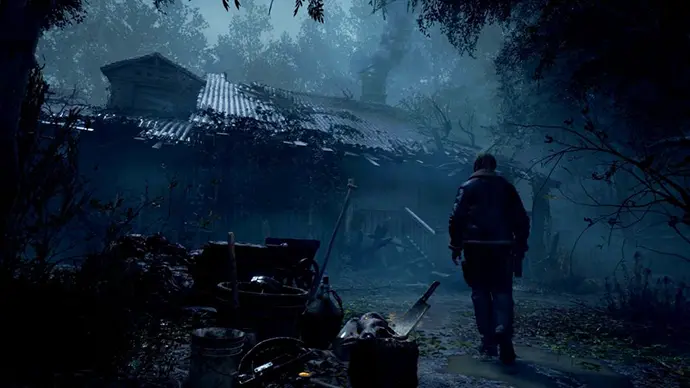 Resident Evil 4 Remake screenshot – Leon approaching cabin in dark forest