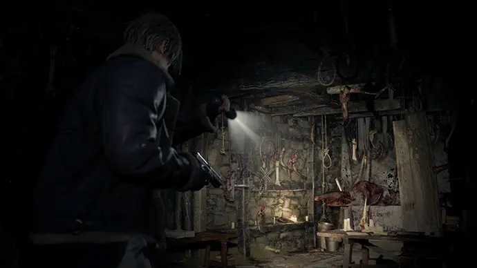 Resident Evil 4 Remake survival horror screenshot – Leon exploring dark cabin with flashlight and gun